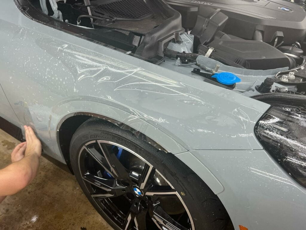 applying paint protection film white BMW Classic details auto Sanford FL