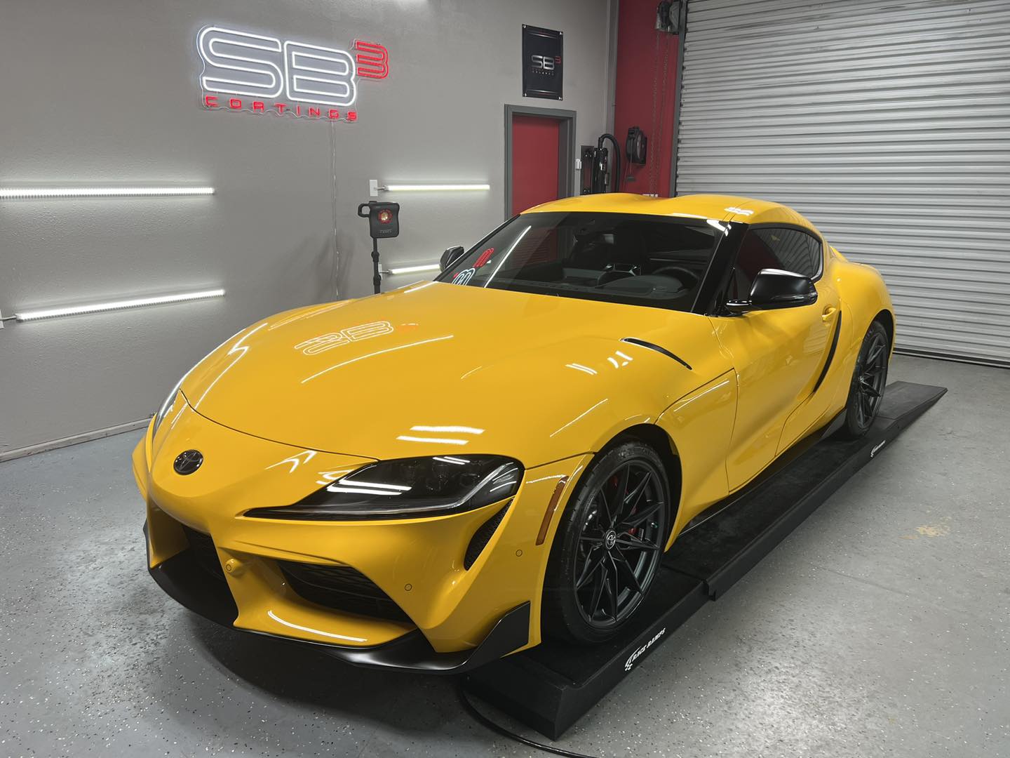 yellow front car toyota ceramic coated with Classic Details Auto Spa in Orlando, Fl