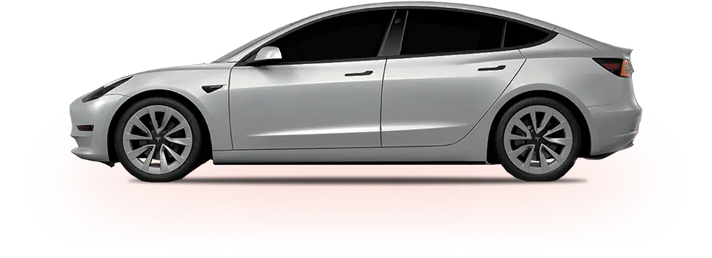 Side view of a silver Tesla Model 3 with tinted windows, set against a black background with a red glow beneath the car.
