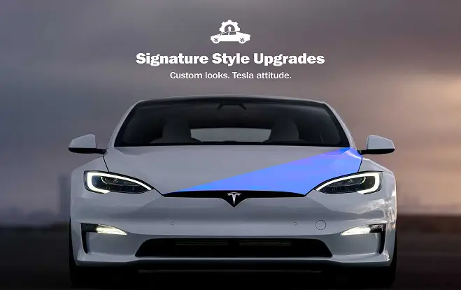 Front view of a white Tesla Model S with a blue accent wrap on the hood, set against a moody sky, accompanied by the text “Signature Style Upgrades” promoting custom Tesla modifications.