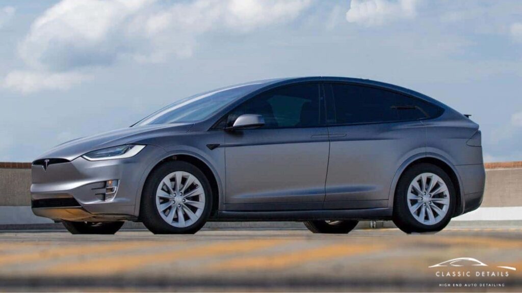 Tesla vehicle with professionally installed window tint showcasing enhanced privacy and sleek appearance